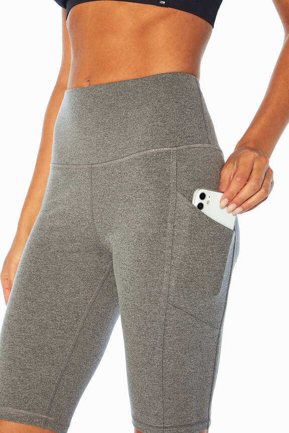 Olivia Side Pocket Tummy Control Bermuda Shorts, alternate angle view, showing visible design features and texture of the soft knit fabric.. 