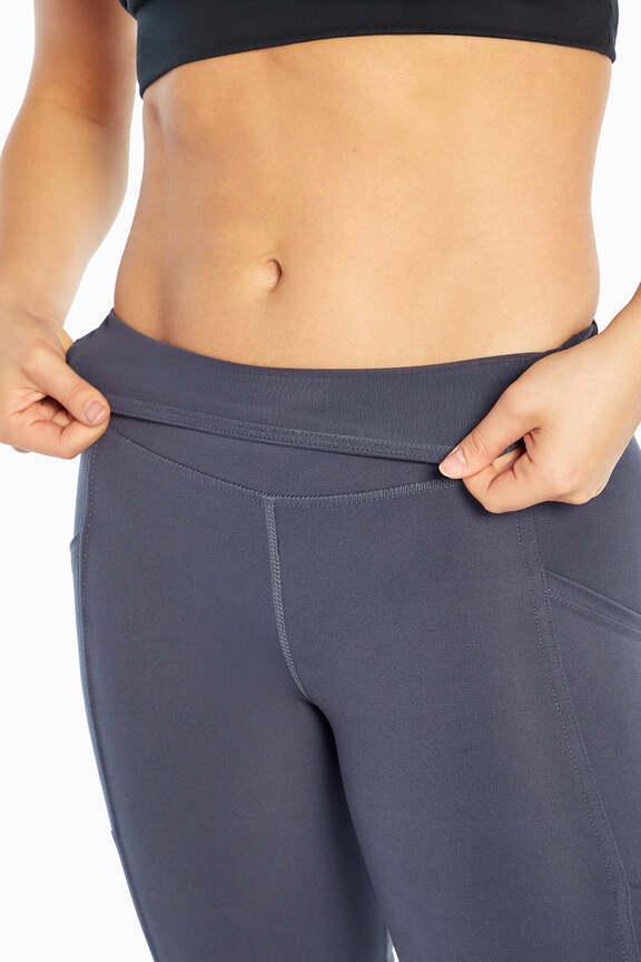 Brenda Side Pocket Tummy Control Bermuda, alternate angle view, showing visible design features and texture of the soft knit fabric.. 