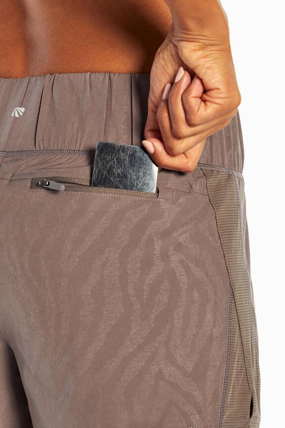 Express Short, alternate angle view, showing visible design features and texture of the soft knit fabric.. 