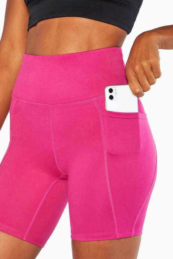 Luna Side Pocket Short, alternate angle view, showing visible design features and texture of the soft knit fabric.. 