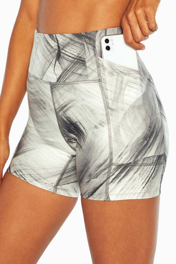 Emma Side Pocket Short, close-up view of fabric and stitching, showing visible design features and texture of the soft knit fabric.. 