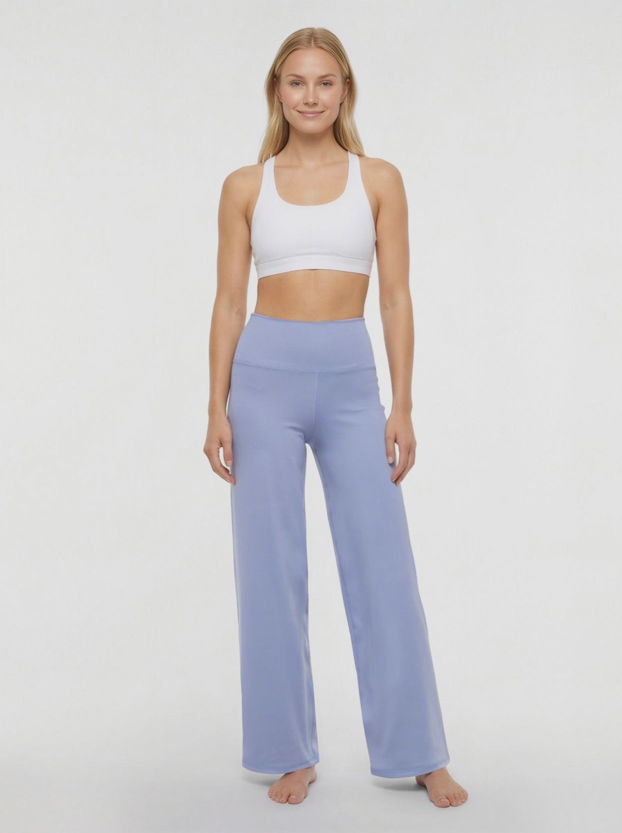 Video view of woman wearing light blue pants on a white background. #color_troposphere
