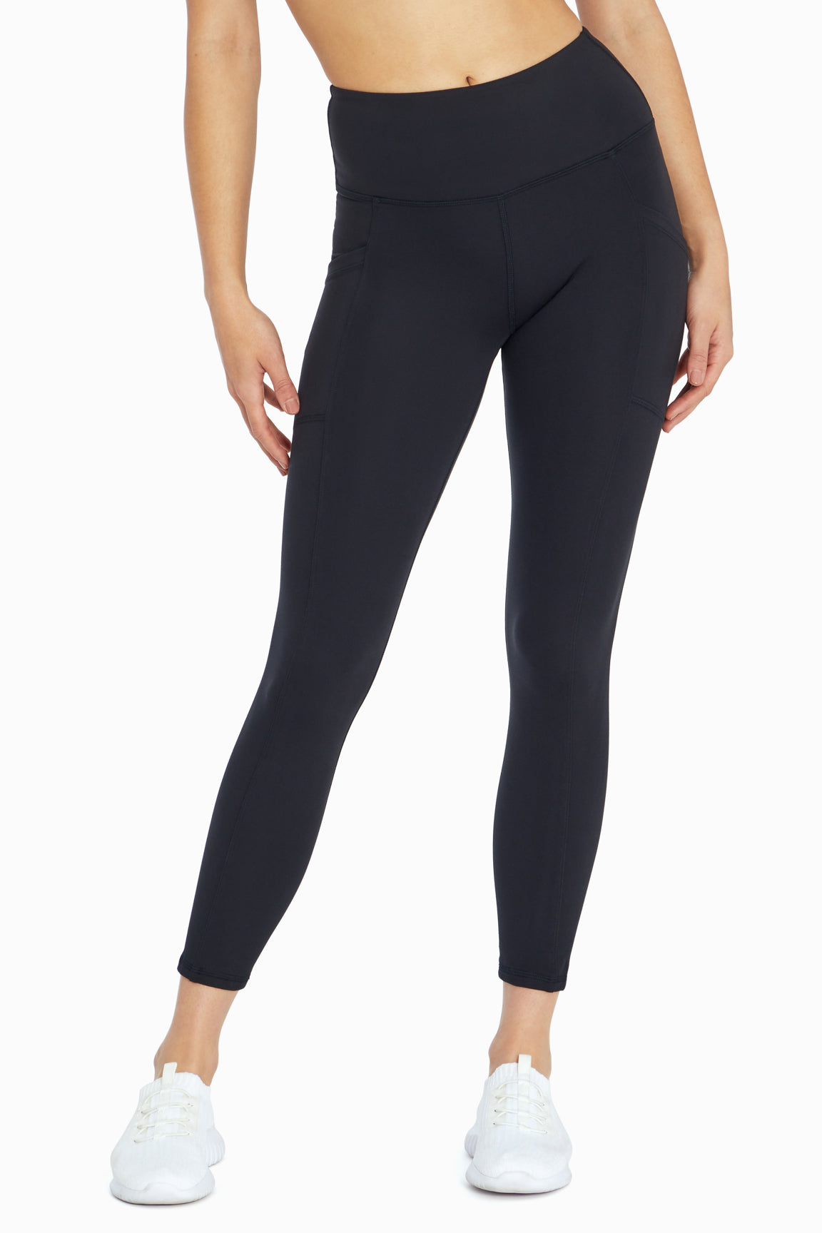 Balance Collection Eclipse Side Pocket Ankle Legging, back view, showing visible design features and texture of the stretch knit fabric.. 