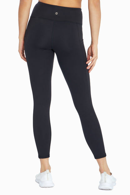 Balance Collection Eclipse Side Pocket Ankle Legging, close-up view of fabric and stitching, showing visible design features and texture of the.. 