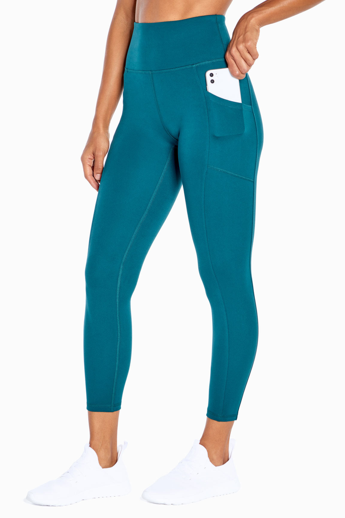 Balance Collection Eclipse Side Pocket Ankle Legging, alternate angle view, showing visible design features and texture of the stretch knit fabric.. 