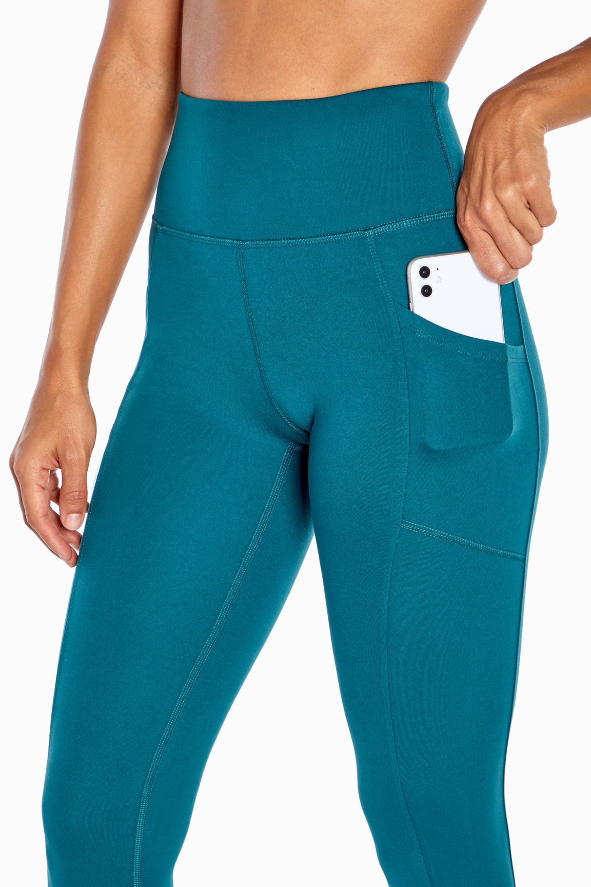 Balance Collection Eclipse Side Pocket Ankle Legging, alternate angle view, showing visible design features and texture of the stretch knit fabric.. 