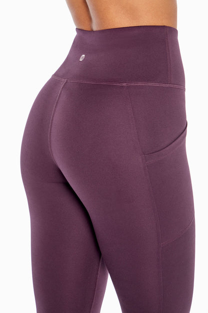 Balance Collection Eclipse Side Pocket Ankle Legging, alternate angle view, showing visible design features and texture of the stretch knit fabric.. 