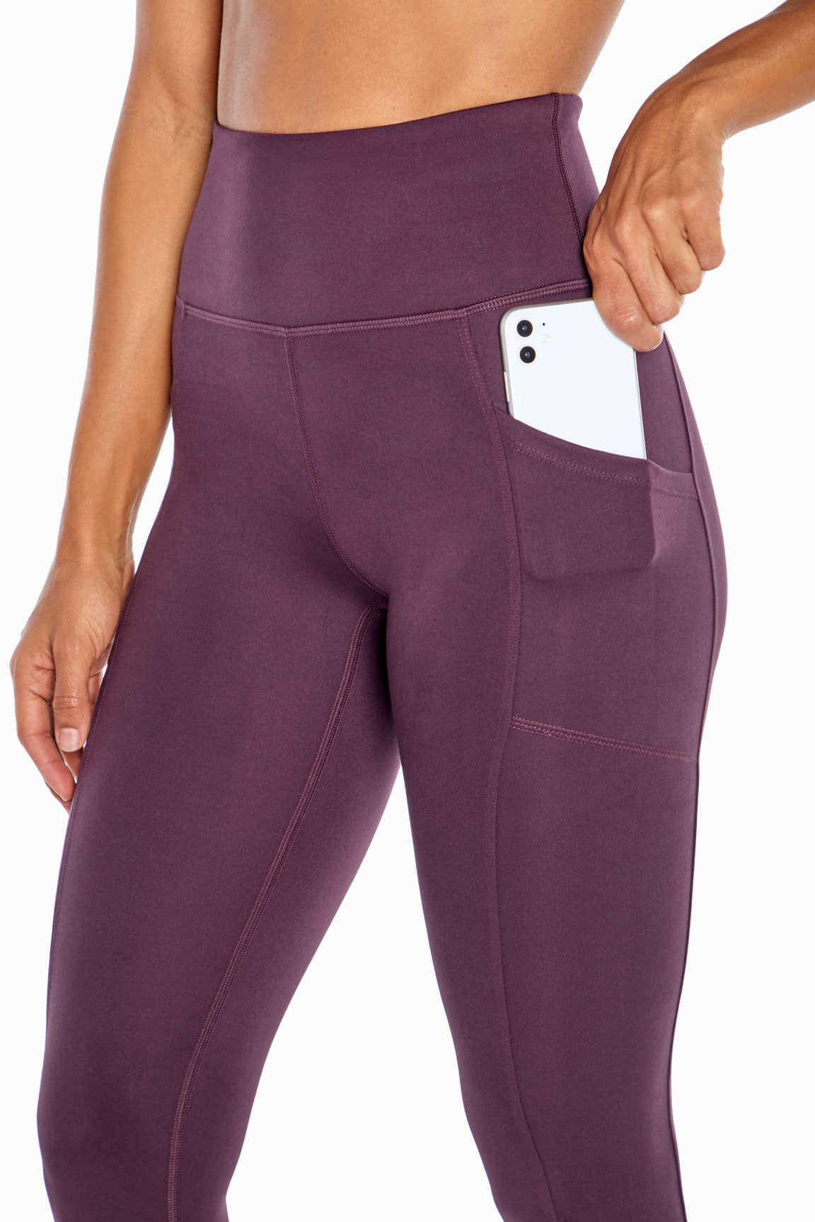 Balance Collection Eclipse Side Pocket Ankle Legging, alternate angle view, showing visible design features and texture of the stretch knit fabric.. 