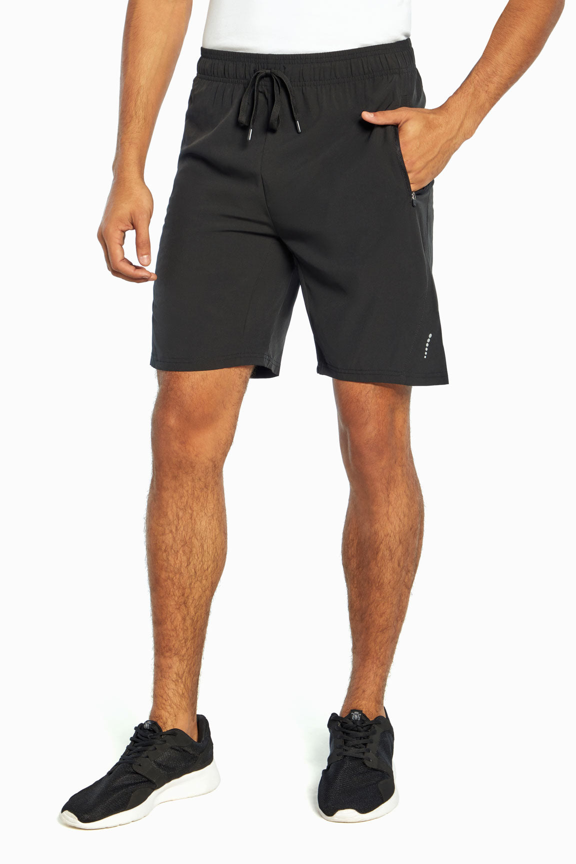 Balance Collection For Men Energy Black Short, front hand in pocket view, showing visible design features and texture of the soft knit fabric. #color_black