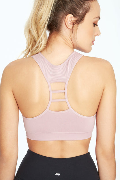 Haley Seamless Sports Bra, alternate angle view, showing visible design features and texture of the soft knit fabric.. 
