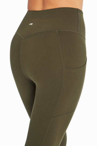 Cameron Side Pocket Tummy Control Legging, alternate angle view, showing visible design features and texture of the stretch knit fabric.. 