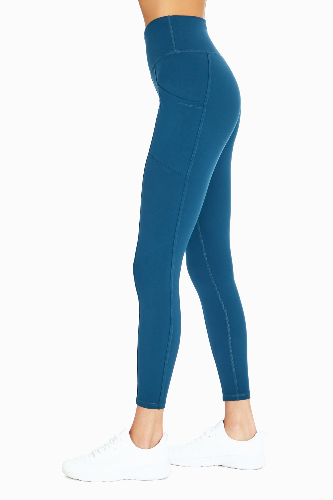 Cameron Side Pocket Tummy Control Legging, alternate angle view, showing visible design features and texture of the stretch knit fabric.. 
